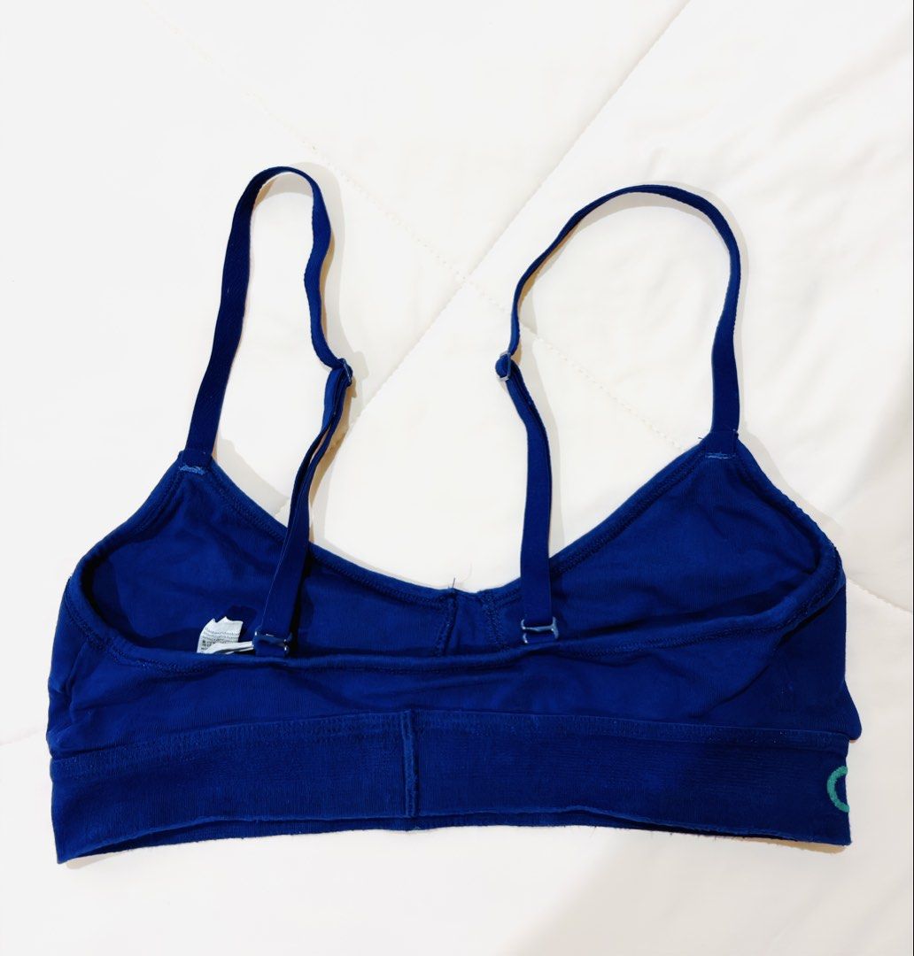 Blue Sports Bra with Adjustable Straps (Category: Activewear) located in Muntinlupa City. Submitted by affordableonlinestuff (Listing ID 1463477755, Image 2). Description: - Comfy blue sports bra - Adjustable straps for a custom fit - Supportive elastic band for extra comfort - Ideal for workouts or everyday wear - Small logo detail on the side.