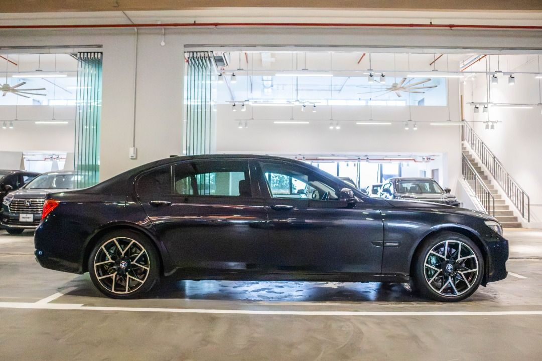 BMW 7 Series 740Li Sunroof (COE till 07/2030) Auto (Category: Used Cars) located in Singapore. Submitted by vinsautogroup (Listing ID 1463375229, Image 2). Description: Consignment Unit Vehicle Features: Powerful N54 3.0L 6 cylinders inline TwinPower turbocharged engine producing 321bhp, 450nm of torque, 6 speed auto transmission, RWD. Accessories: 20" sports rims, M multi function steering wheel, soft close suction doors, Sunroof, rear air condi