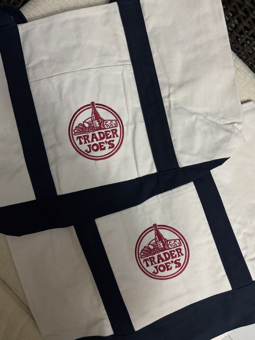 [BNWT] Trader Joe’s Navy Tote Bag (Category: Tote Bags) located in Paranaque City. Submitted by margauxm (Listing ID 1463475636, Image 3). Description: [TRADER JOE’S — Navy Tote Bag] — Brand new!! Straps are in Navy — Bought in Trader Joe’s Houston, Texas — Material is thick and durable — Perfect for everyday use, for errand days, or anywhere! AVAILABLE QUANITITY: 2 .