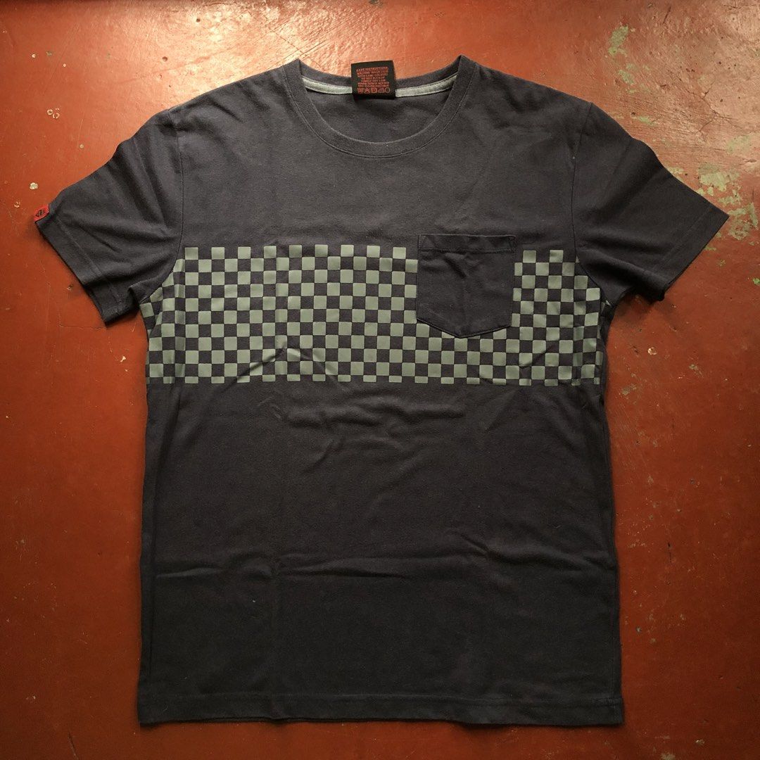 Bny Utd Tee (Category: Tshirts & Polo Shirts ) located in Manila. Submitted by dopethrift.cat (Listing ID 1463396490, Image 1). Description: Dimension: Inches Width: 19" Length: 25" Sleeve: 8" mop: gcash ship: lalamove or jnt - Grey Bny Utd T-shirt - Size: Large (L) - Unique checkered pattern across the chest - Chest pocket detail - Proudly made in Brooklyn, New York - Care: Machine wash cold with similar colors, do not bleach, tumble dry low, wa