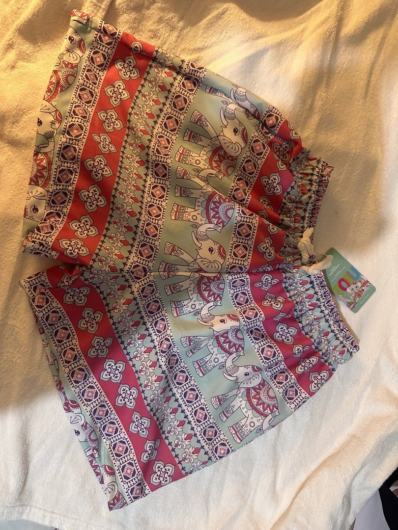 Boho Elephant Print Shorts with Elastic Waistband (Category: Shorts) located in Makati City. Submitted by msjlarsen (Listing ID 1463494586, Image 1). Description: - from Thailand elephant and floral UNISEX short - Pretty light blue and pink colors - Comfortable elastic waistband - Brand new with tags still attached.