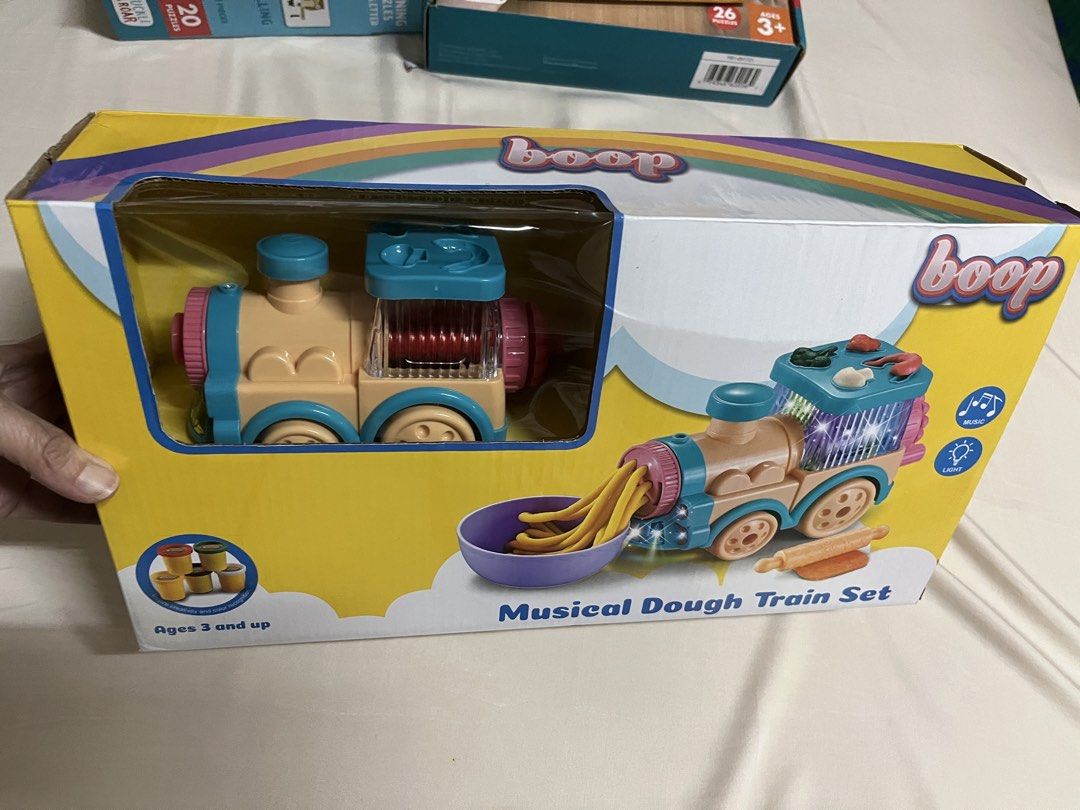 Boop Musical Dough Train Set Ages 3+ (Category: Kids Toys) located in Quezon City. Submitted by muffet9 (Listing ID 1463487869, Image 3). Description: — Brand New, sealed in box -can be given as gift -Fun musical dough train set for kids aged 3+ - Create fun shapes with the dough - Features lights and music for engaging play - Perfect for fostering creative development.