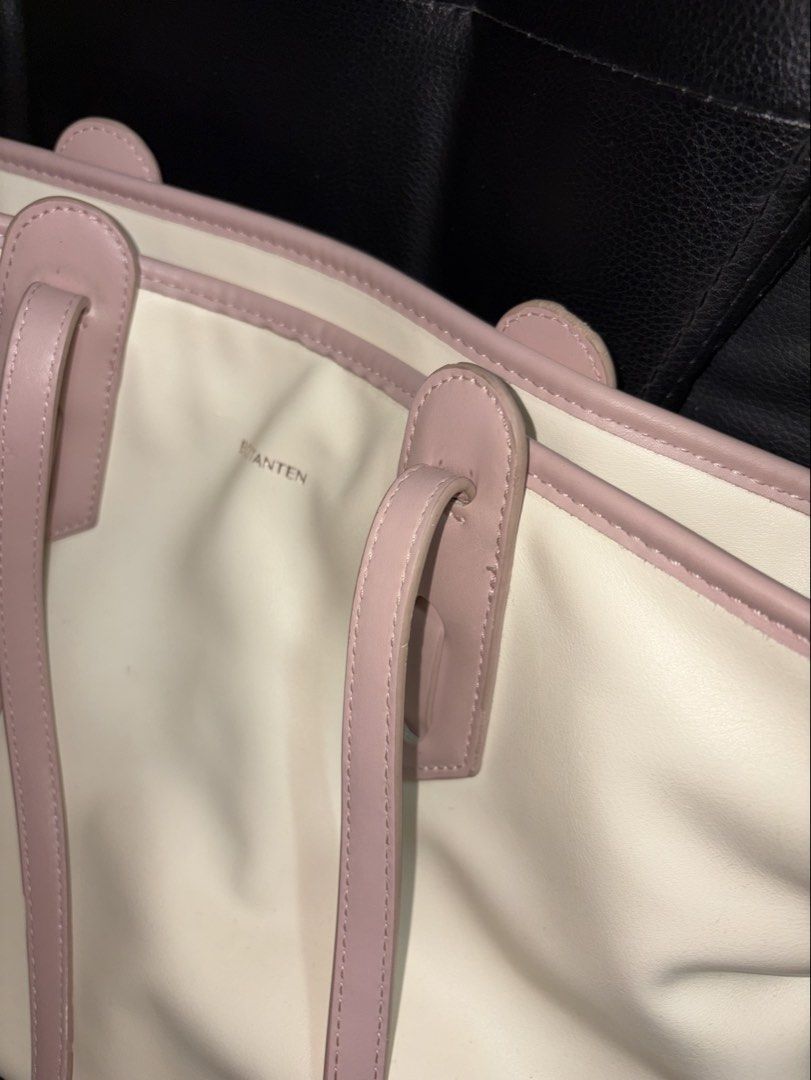 Bostanten Tote Bag (Category: Tote Bags) located in Manila. Submitted by rare_pretty_finds (Listing ID 1463440648, Image 2). Description: - Stylish cream tote bag with elegant pink trim and handles. - Spacious interior, ideal for everyday essentials. - Comfortable handles for easy carrying. - Versatile design suitable for school, work, or casual outings. 📍Quezon City.