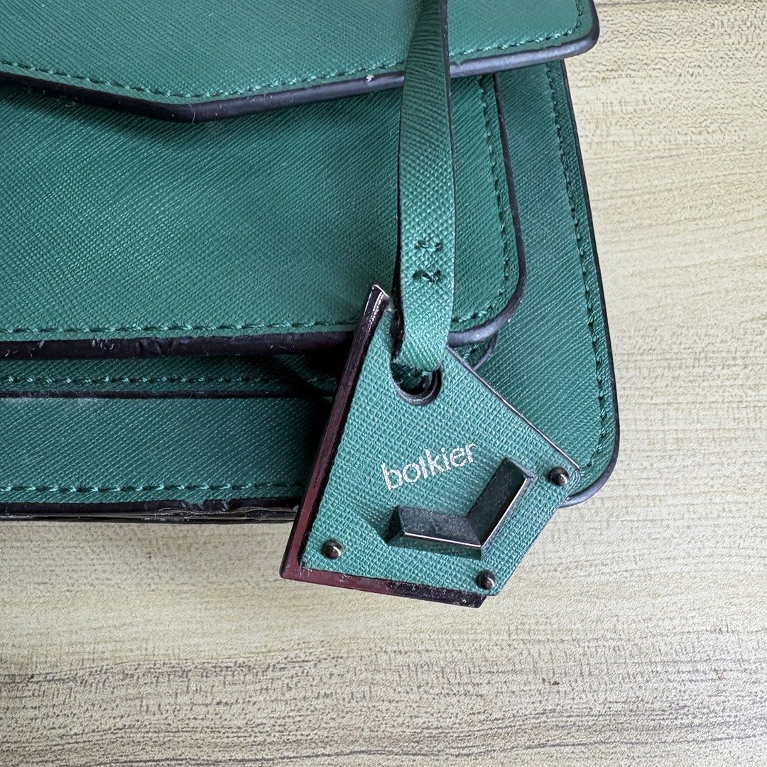 Botkier Green Handbag with Crossbody Strap (Category: Cross-body Bags) located in Angeles City. Submitted by muse_archive (Listing ID 1463432369, Image 2). Description: - Authentic Green Botkier Handbag - Detachable crossbody strap included - Convenient front flap pocket - Handy back slip pocket Ideal size for essentials.
