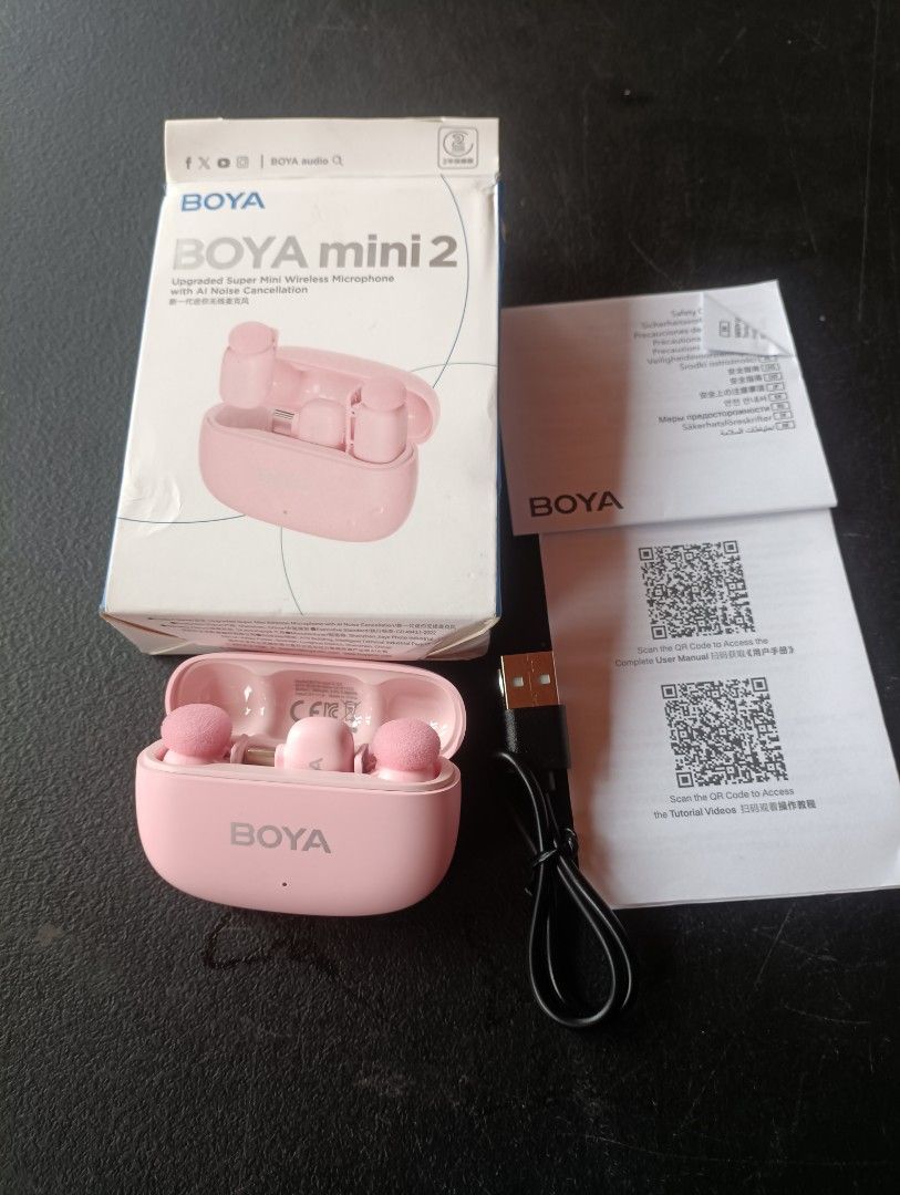 BOYA mini 2 Upgraded Super Mini Wireless Microphone Earbuds Pink (Category: Earphones) located in Caloocan City. Submitted by fastwater_570940 (Listing ID 1463392892, Image 2). Description: - Upgraded BOYA mini 2 super mini wireless microphone earbuds - Stylish pink color - Comes with a convenient charging case - Includes USB cable for charging - Safety guide and user manual provided - Ideal for high-quality recordings and clear calls.