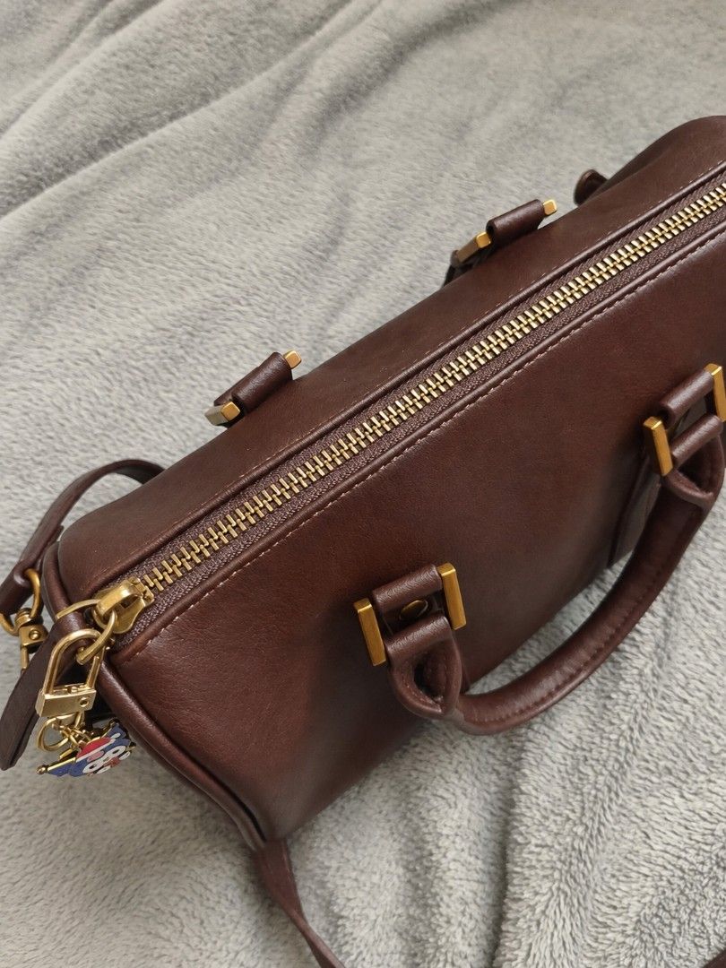 Brown Barrel Bag with Cute Charm included (Category: Purses & Pouches) located in La Trinidad. Submitted by honeysplushies2 (Listing ID 1463422850, Image 3). Description: like new condition very classy no flaws quality material .
