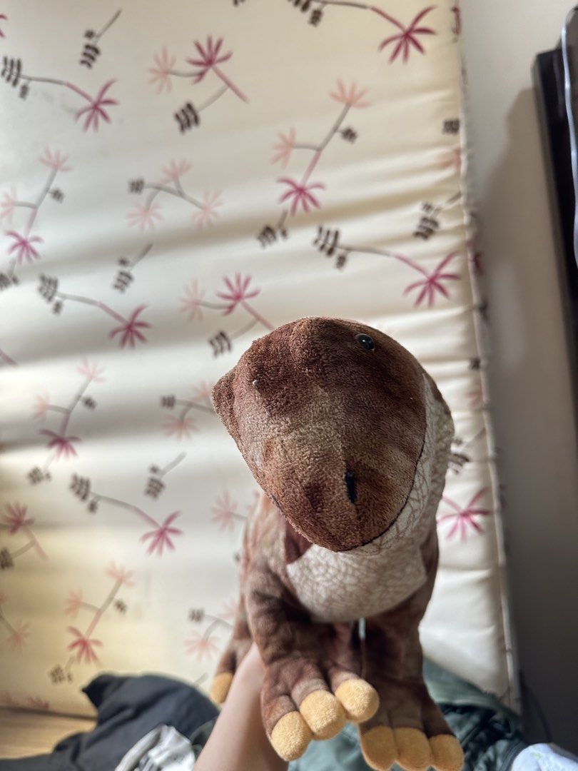 Brown Dinosaur Plush Toy Stuffed Animal (Category: Plushies & Soft Toys) located in Valenzuela. Submitted by shopwithmika (Listing ID 1463373486, Image 2). Description: - Adorable brown dinosaur plush toy - Super soft and cuddly material - Approximately 15 inches in length - Ideal gift for children or dinosaur enthusiasts - Eager to find its new forever home!.