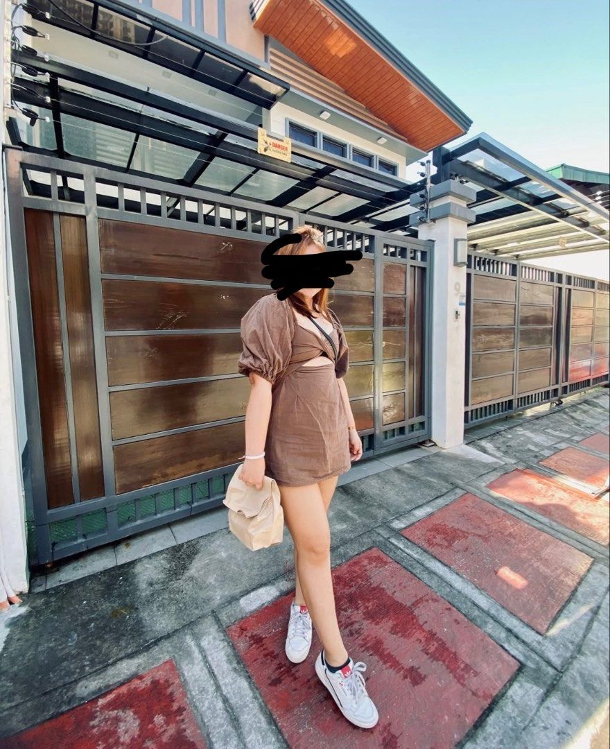 Brown Puff Sleeve Cutout Mini Dress (Category: Dresses) located in Manila. Submitted by jicka (Listing ID 1463329947, Image 1). Description: - Cute brown mini dress - Features puff sleeves - Front cutout detail - Back cutout detail - Versatile for casual or night out - Pairs well with sneakers or heels - Comfortable fabric - Great fit - Bought for ₱450. Selling for ₱139.