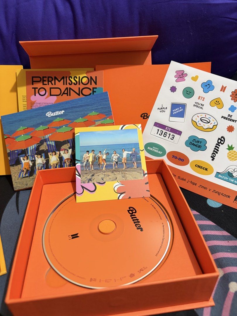 BTS Butter & Permission to Dance CD Set (Category: CDs & DVDs) located in Manila. Submitted by ahnamaesan06047 (Listing ID 1463395911, Image 2). Description: - BTS Butter & Permission to Dance CD Sets - Available in Yellow and Orange versions - Includes: CD, photocard, stickers, and more! - A must-have for any ARMY!.