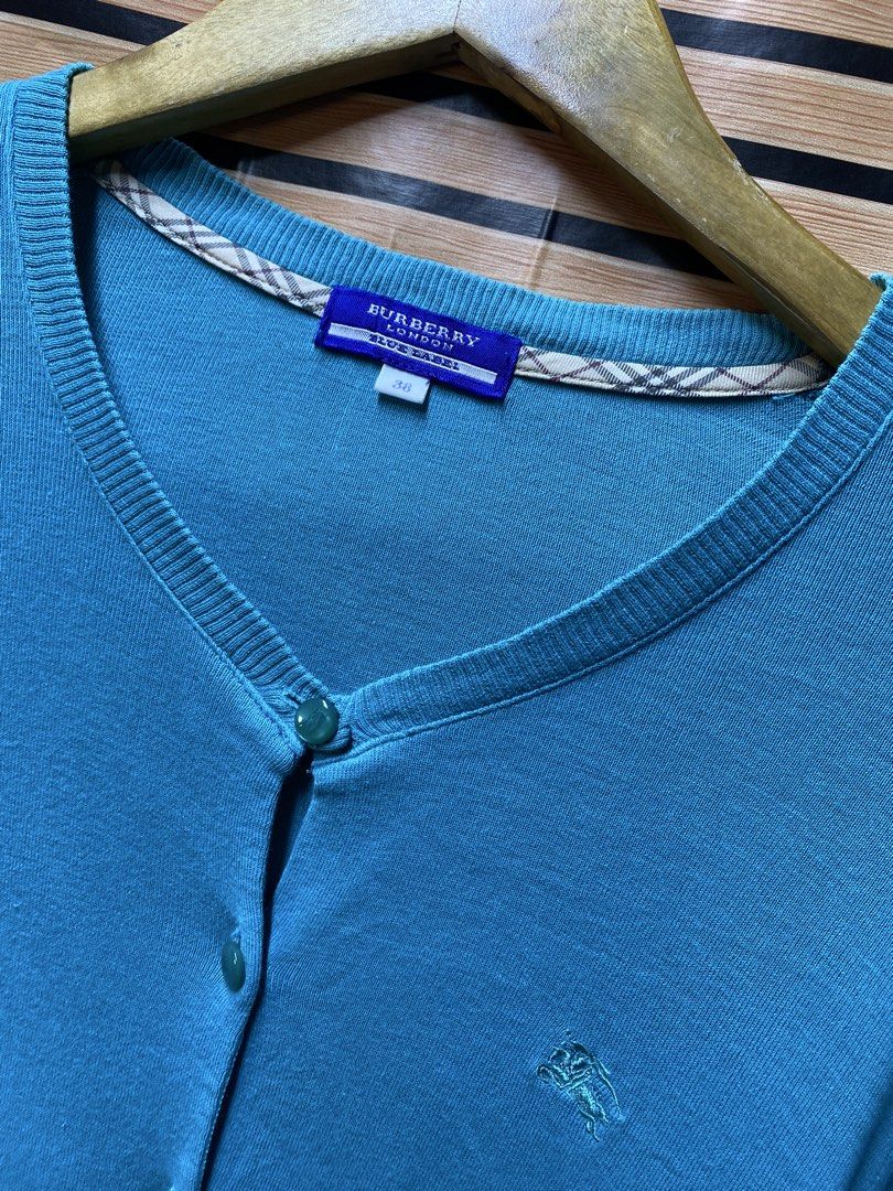 BURBERRY CARDIGAN (Category: Longsleeves) located in Makati City. Submitted by drip.poww (Listing ID 1463518928, Image 3). Description: - Authentic Burberry - Color: Light blue - Size: Meduim - Dimes: 20x23 - Authentic - Excellent condition - Need wash, fresh from bale - Material: 100% Cotton Please don’t expect too much—these are thrifted (ukay) items. 😊 !!STILL NEGOTIABLE!!.