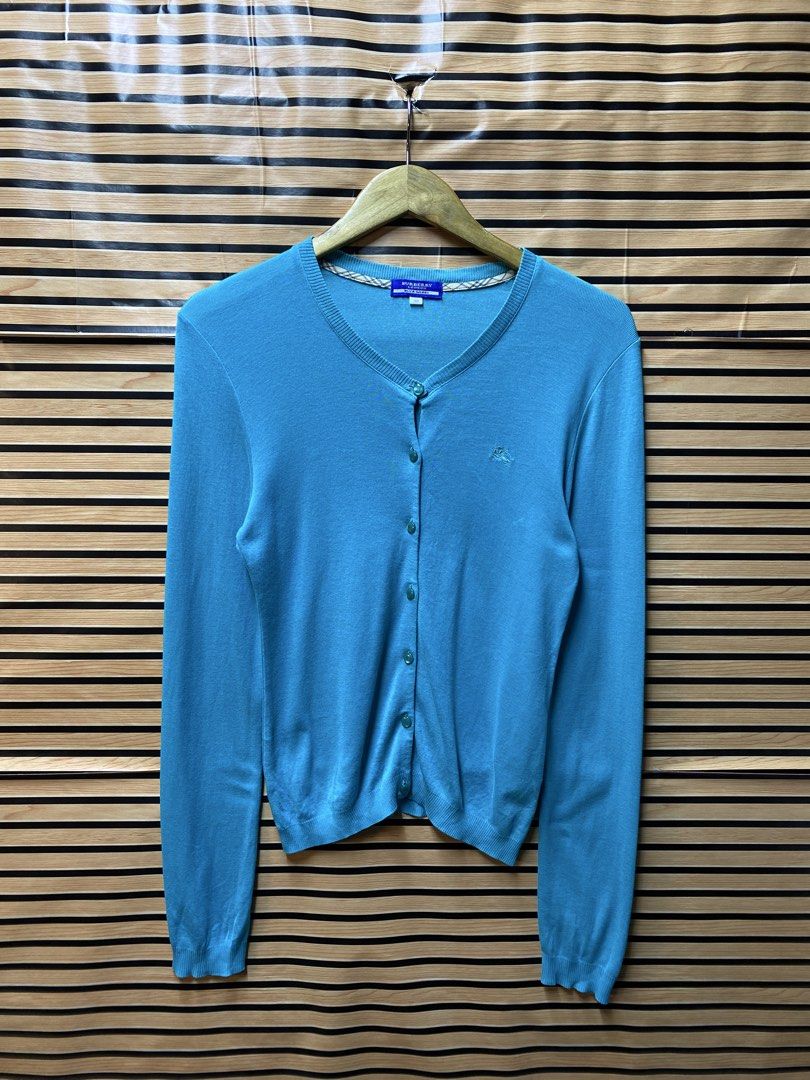 BURBERRY CARDIGAN (Category: Longsleeves) located in Makati City. Submitted by drip.poww (Listing ID 1463518928, Image 1). Description: - Authentic Burberry - Color: Light blue - Size: Meduim - Dimes: 20x23 - Authentic - Excellent condition - Need wash, fresh from bale - Material: 100% Cotton Please don’t expect too much—these are thrifted (ukay) items. 😊 !!STILL NEGOTIABLE!!.