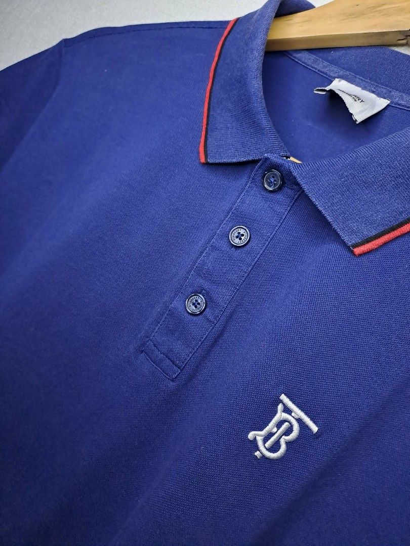 Burberry Monogram (Category: Luxury Apparel) located in Quezon City. Submitted by yaseen73 (Listing ID 1463383052, Image 2). Description: Authentic Thomas Burberry Monogram Embroidery Cotton Piquè Blue / Red Polo Shirt Wearing Size : Medium on Tag Dimensions : Please Refer to the Photo Color Rate : 9.5/10 - With Sign of Usage - Condition : 4.5/5 or Best Offer G C A S H B A N K T R A N S F E R Courier : J&T Lalamove Seller's Location : 📍Brgy. Pan