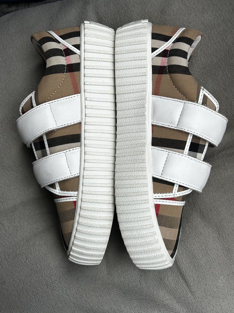 Burberry Nova Check Sneakers with White Straps (Category: Sneakers) located in Cebu City. Submitted by yenetcuba52435 (Listing ID 1463331930, Image 2). Description: - Iconic Burberry Nova Check pattern - White leather straps for a secure fit - Burberry logo embossed on soles - Ideal for casual wear - Adds a stylish touch to any outfit Pambata.