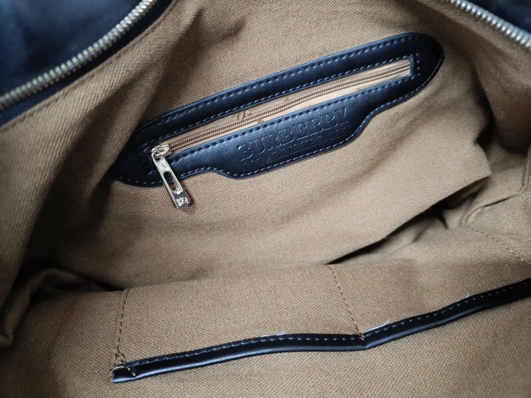 Burberry Tote Bag with Pouch (Category: Luxury Bags & Wallets) located in Manila. Submitted by aisasalvad24335 (Listing ID 1463494894, Image 3). Description: - Classic Burberry tote bag - Includes matching pouch - Beige canvas with signature check pattern - Black leather trim - Interior zippered pocket - Ideal for everyday use or travel - Spacious and stylish design - Carry by top handles.