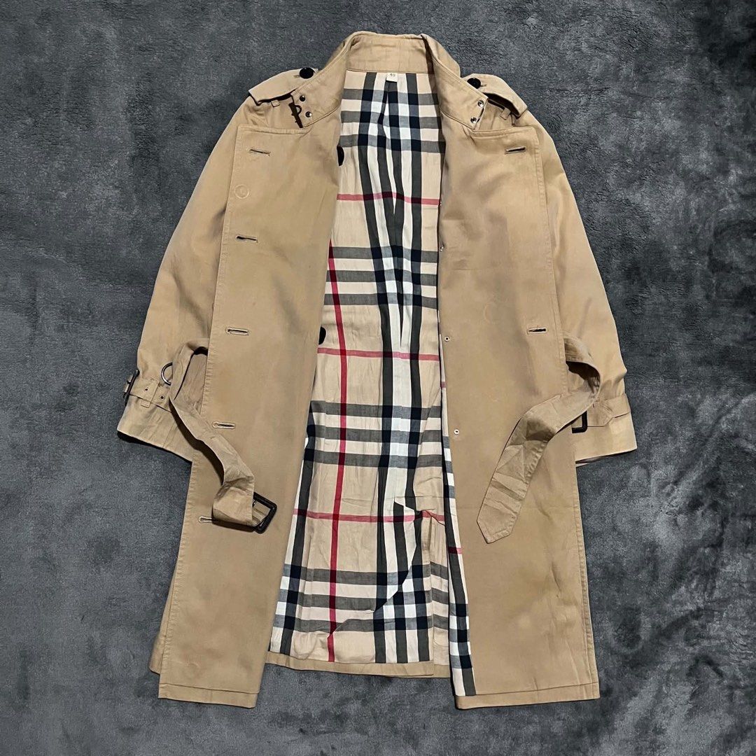 Burberry Trench Coat (Category: Coats, Jackets and Outerwear) located in Cagayan de Oro. Submitted by montresor.ph (Listing ID 1463338541, Image 2). Description: Condition: Excellent Width: 19 Length: 40 Color rate: 9.5/10 Price: 2,500.
