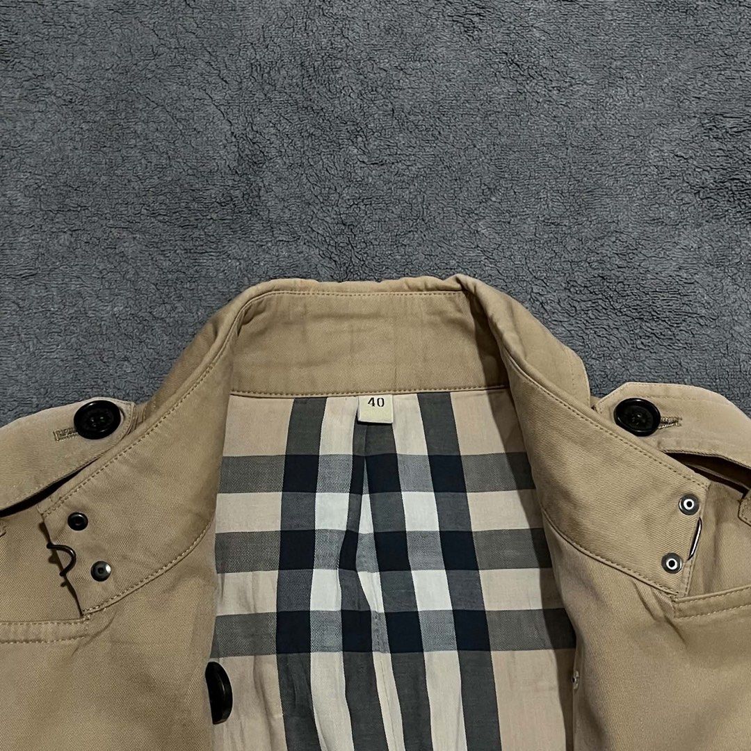 Burberry Trench Coat (Category: Coats, Jackets and Outerwear) located in Cagayan de Oro. Submitted by montresor.ph (Listing ID 1463338541, Image 3). Description: Condition: Excellent Width: 19 Length: 40 Color rate: 9.5/10 Price: 2,500.