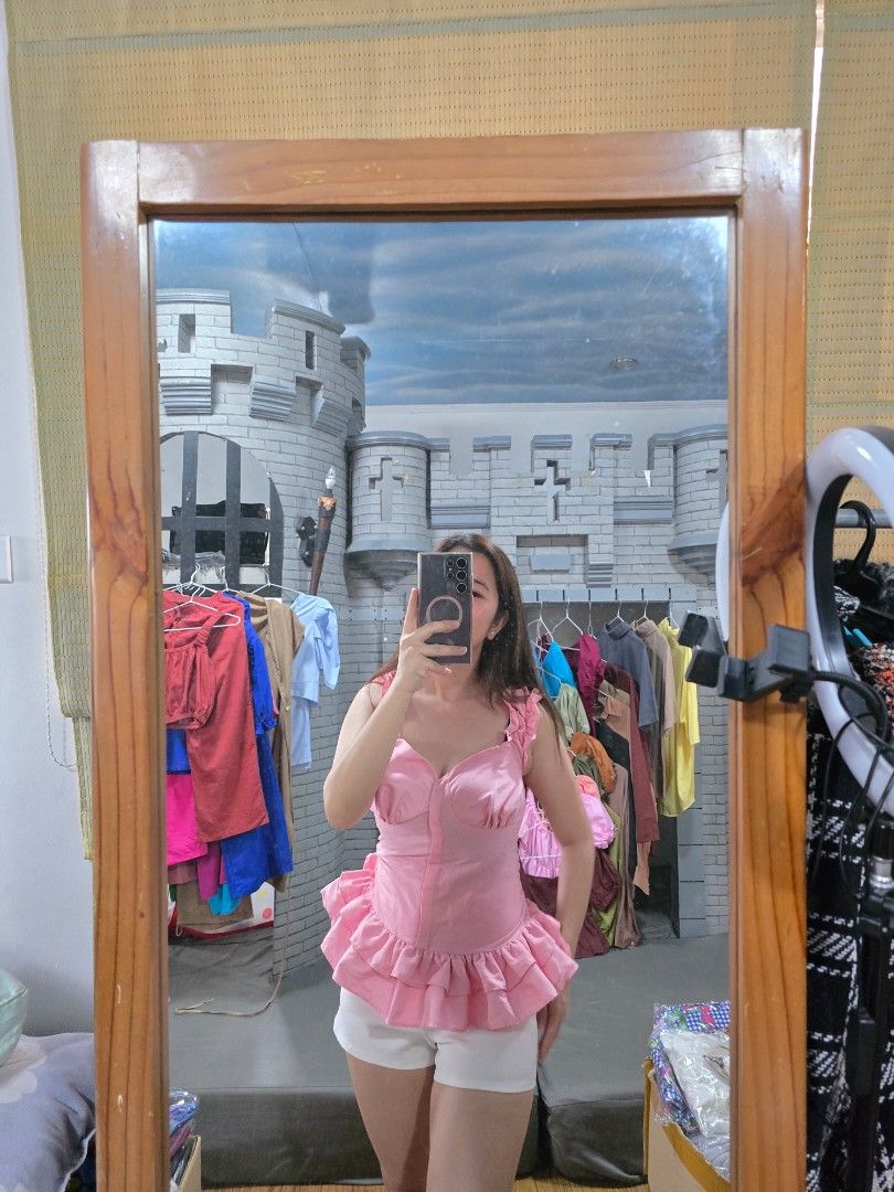 Bustier Baby Doll Top (Category: Others Tops) located in Manila. Submitted by kayencee_27 (Listing ID 1463503075, Image 3). Description: Brandnew Rare Tops With clear plastic Color pink and maroon blue avail Bustier and scrunchies straps Ruffles designs and smocking sa back Bust - 30"/36".