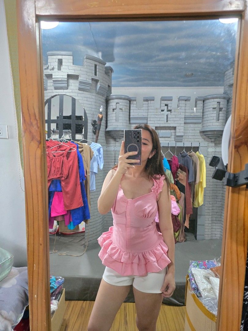 Bustier Baby Doll Top (Category: Others Tops) located in Manila. Submitted by kayencee_27 (Listing ID 1463503075, Image 2). Description: Brandnew Rare Tops With clear plastic Color pink and maroon blue avail Bustier and scrunchies straps Ruffles designs and smocking sa back Bust - 30"/36".