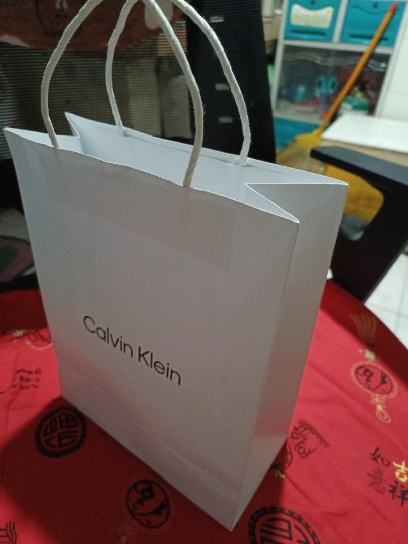 Calvin Klein paper bag medium size (Category: Storage Boxes & Baskets) located in Pasay City. Submitted by khim1202ma07307 (Listing ID 1463450433, Image 2). Description: .