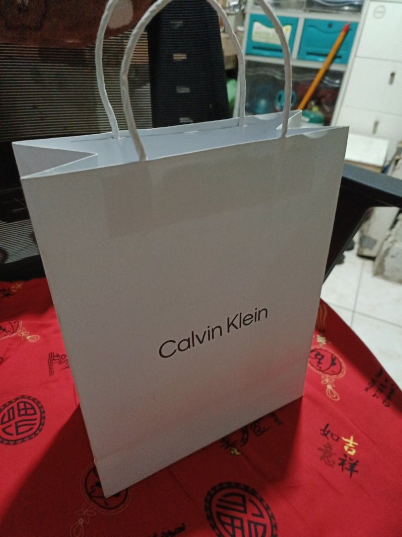 Calvin Klein paper bag medium size (Category: Storage Boxes & Baskets) located in Pasay City. Submitted by khim1202ma07307 (Listing ID 1463450433, Image 1). Description: .