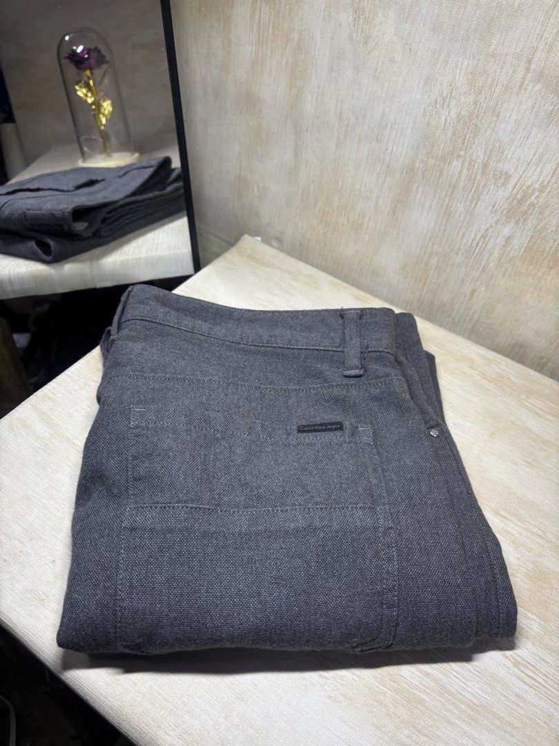 CALVIN KLEIN TROUSER PANTS (Category: Trousers) located in Cabuyao City. Submitted by pormanation-thrift-store (Listing ID 1463550438, Image 2). Description: CALVIN KLEIN TROUSER PANTS Condition: LIKE NEW Color rate: 10/10 (PWEDE SA MASELAN) Size: 34 Dimes: 34”Wx41”L Issue: NONE❌ Price: 1500.