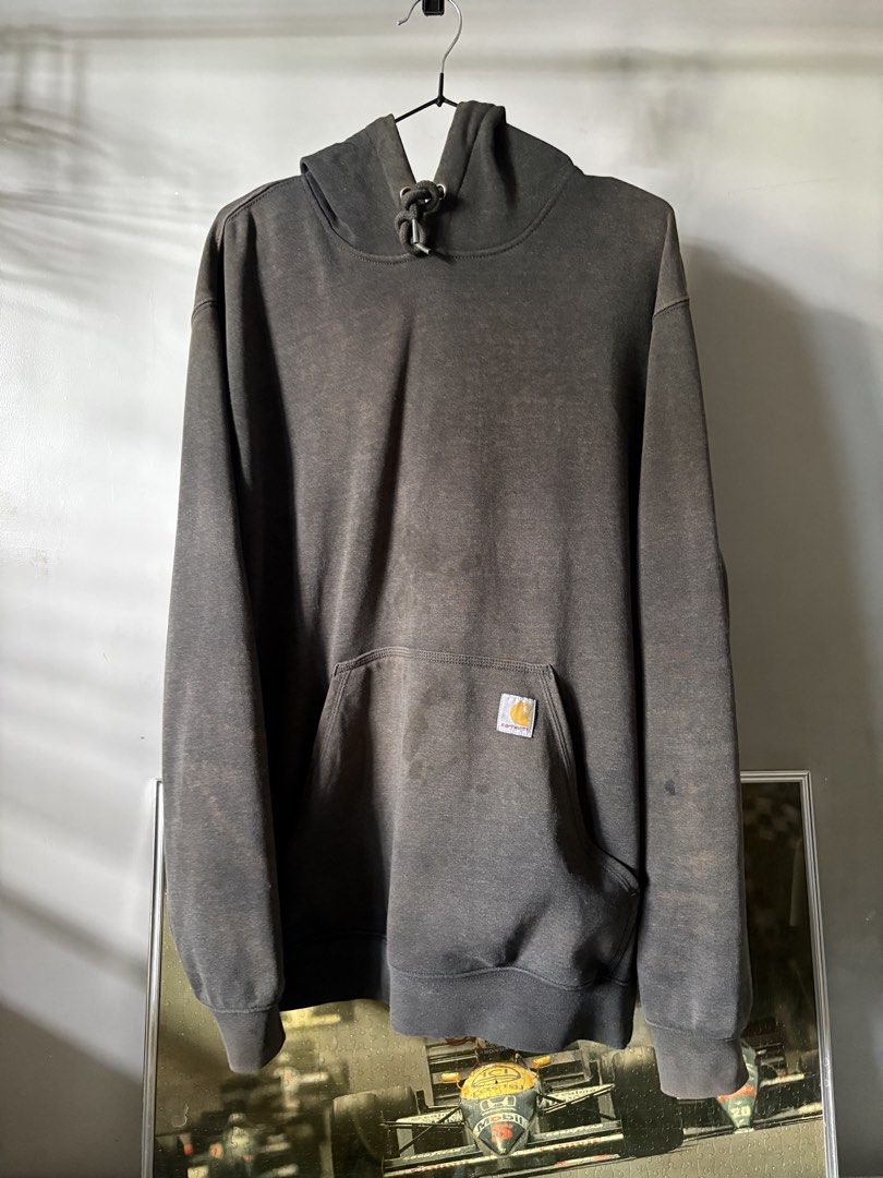 Carhartt faded black pullover hoodie (Category: Coats, Jackets and Outerwear) located in General Santos City (Dadiangas). Submitted by artsupply.co (Listing ID 1463380839, Image 1). Description: Size medium on tag, actual size large Dimension width 25 length 30 Trash condition Color rate 7/10 Authentic Issue there is some discoloration and fading in other parts plus an oil stain. For personal use only. Vintage vibes and condition Located in Gener