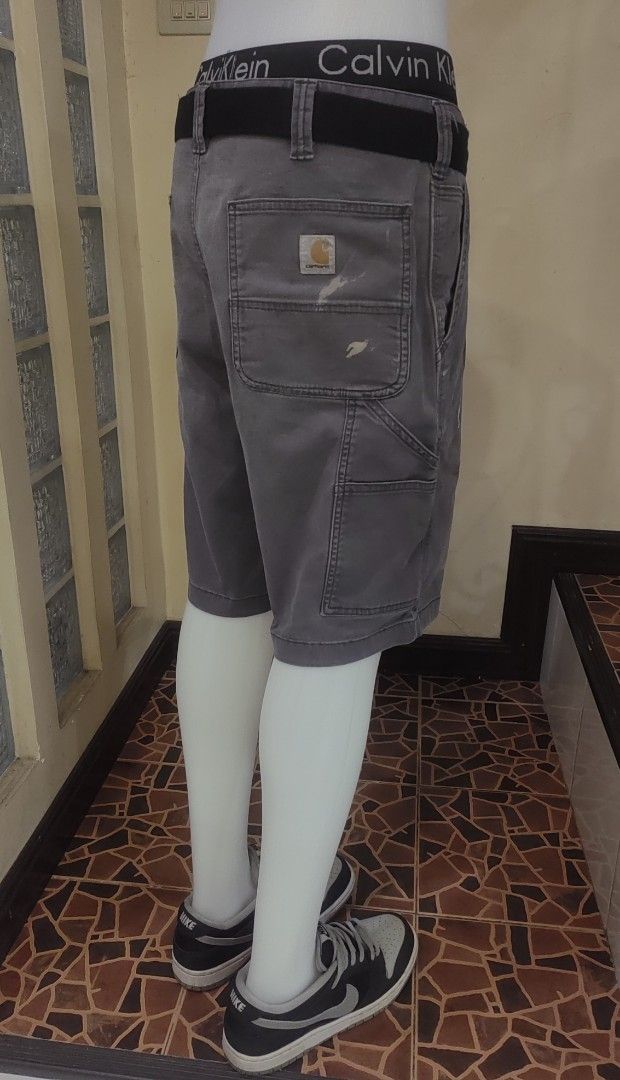 Carhartt Grey Work Shorts (Category: Shorts) located in Manila. Submitted by livedolphin_68dee2 (Listing ID 1463553317, Image 1). Description: - Grey Carhartt work shorts - Classic carpenter style with multiple pockets - Durable and comfortable fabric - Suitable for work or casual wear.