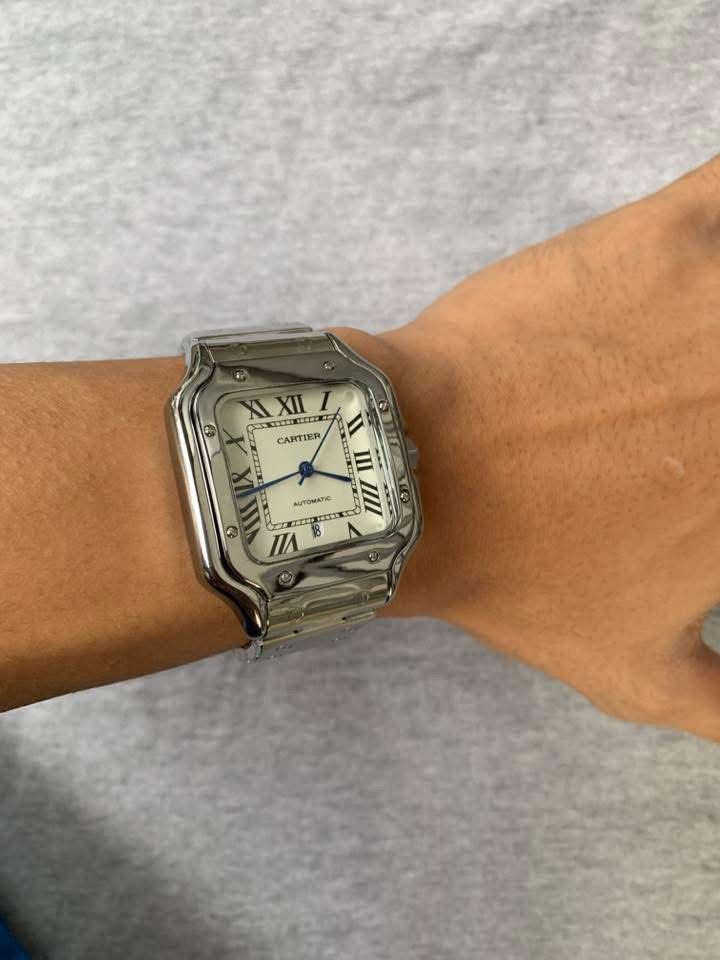 Cartier Santos Silver Automatic Blue Crown (Category: Men's Watches) located in Manila. Submitted by jaivrgr22 (Listing ID 1463402795, Image 2). Description: Excellent Condition All Working / No issue With Hard Box & Paper Bag .