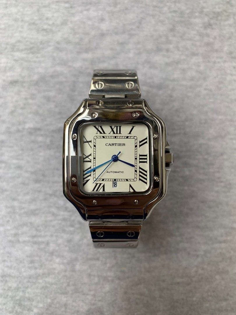 Cartier Santos Silver Automatic Blue Crown (Category: Men's Watches) located in Manila. Submitted by jaivrgr22 (Listing ID 1463402795, Image 1). Description: Excellent Condition All Working / No issue With Hard Box & Paper Bag .