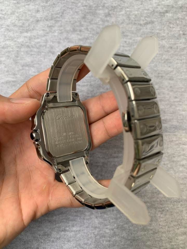 Cartier Santos Silver Automatic Blue Crown (Category: Men's Watches) located in Manila. Submitted by jaivrgr22 (Listing ID 1463402795, Image 3). Description: Excellent Condition All Working / No issue With Hard Box & Paper Bag .