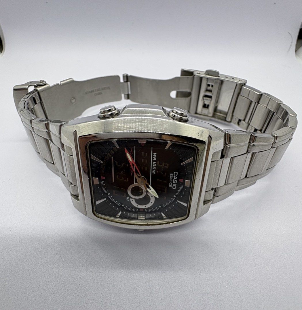 Casio Edifice Square Futuristic Rare (Category: Men's Watches) located in Quezon City. Submitted by rentoti (Listing ID 1463377961, Image 2). Description: - Brand: Casio Edifice - Style: Square, Futuristic - Material: Stainless Steel - Water Resistance: 100M (WR 100M) - Features: Dual display (analog and digital), Auto-light, Chronograph, Thermometer, Alarm - Rarity: Rare model - Fits 7 inch wrist .