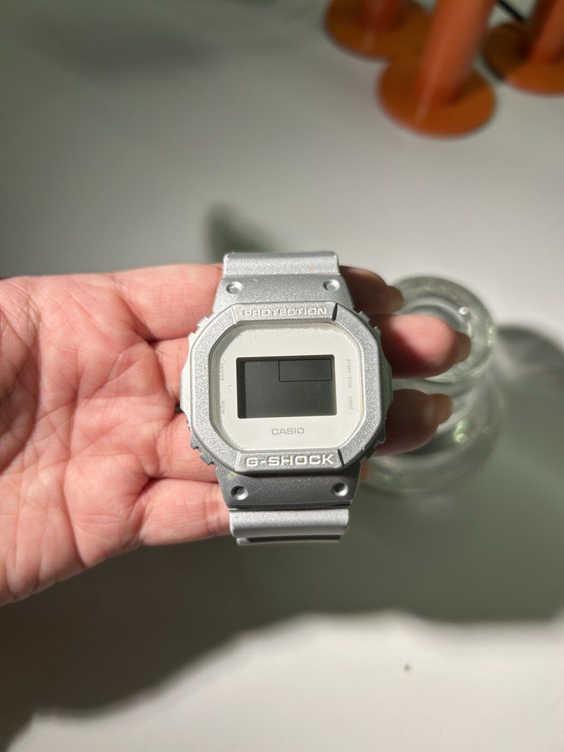 Casio G-Shock Protection Watch (Category: Men's Watches) located in Manila. Submitted by hyacinth1414 (Listing ID 1463464695, Image 1). Description: - Classic silver Casio G-Shock watch - Square face with digital display - Iconic protection model - Great for everyday wear - Ready for a new owner.
