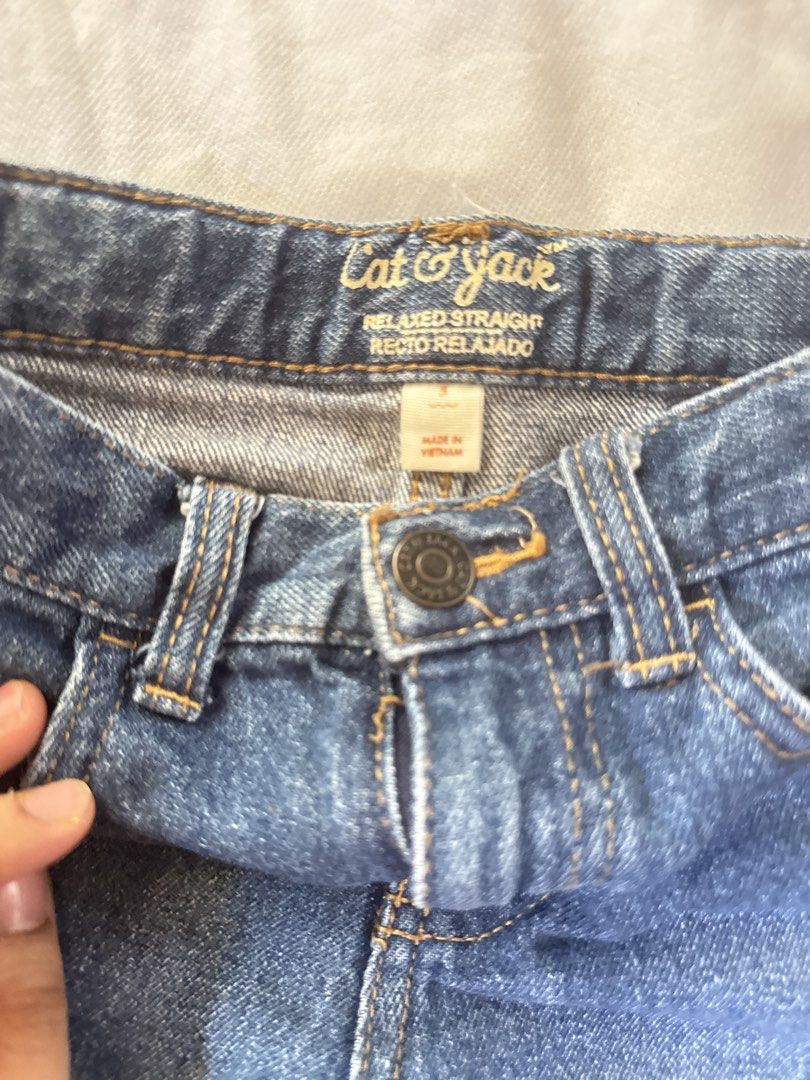 Cat & Jack Relaxed Straight Jeans Size 5 (Category: Babies & Kids Fashion) located in Lucena. Submitted by jaejae___ (Listing ID 1463552666, Image 1). Description: - Brand: Cat & Jack - Color: Blue Denim - Size: 5 - Fit: Relaxed Straight - Style: Classic 5-pocket - Closure: Button and zip - Origin: Made in Vietnam - Ideal for: Everyday wear.
