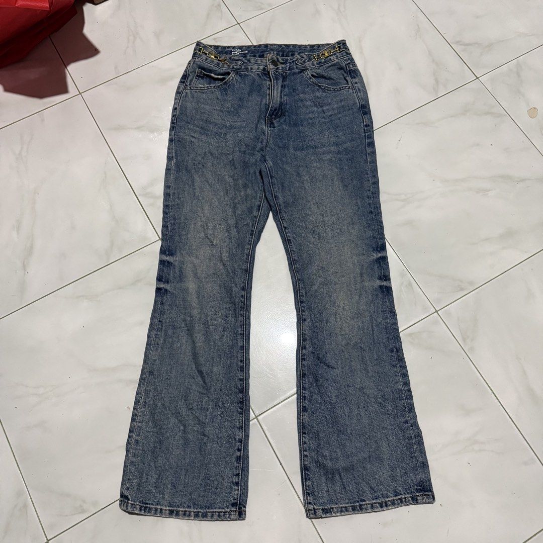 CELINE Dylan Flared Jeans with Chain Detail (Category: Jeans) located in Manila. Submitted by preciousma24494 (Listing ID 1463412587, Image 1). Description: - Blue wash denim jeans 27-28 length:38 - Flared leg style - Gold chain detail at waistband - Button and zip closure - Classic five-pocket design - Perfect for a stylish outfit.