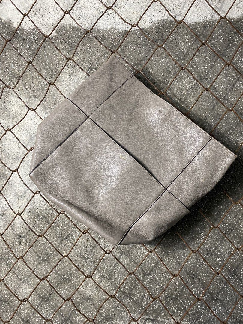 Celine Grey Leather Tote Bag (Category: Activewear) located in Cabanatuan. Submitted by brightwater-2083 (Listing ID 1463503791, Image 1). Description: - Celine grey leather tote bag - Soft, pebbled leather with subtle stitching details - Minimalist and chic design, ideal for everyday wear - A versatile and stylish addition to your wardrobe.