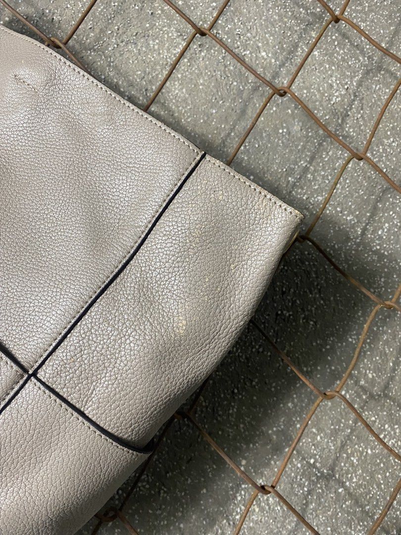 Celine Grey Leather Tote Bag (Category: Activewear) located in Cabanatuan. Submitted by brightwater-2083 (Listing ID 1463503791, Image 3). Description: - Celine grey leather tote bag - Soft, pebbled leather with subtle stitching details - Minimalist and chic design, ideal for everyday wear - A versatile and stylish addition to your wardrobe.