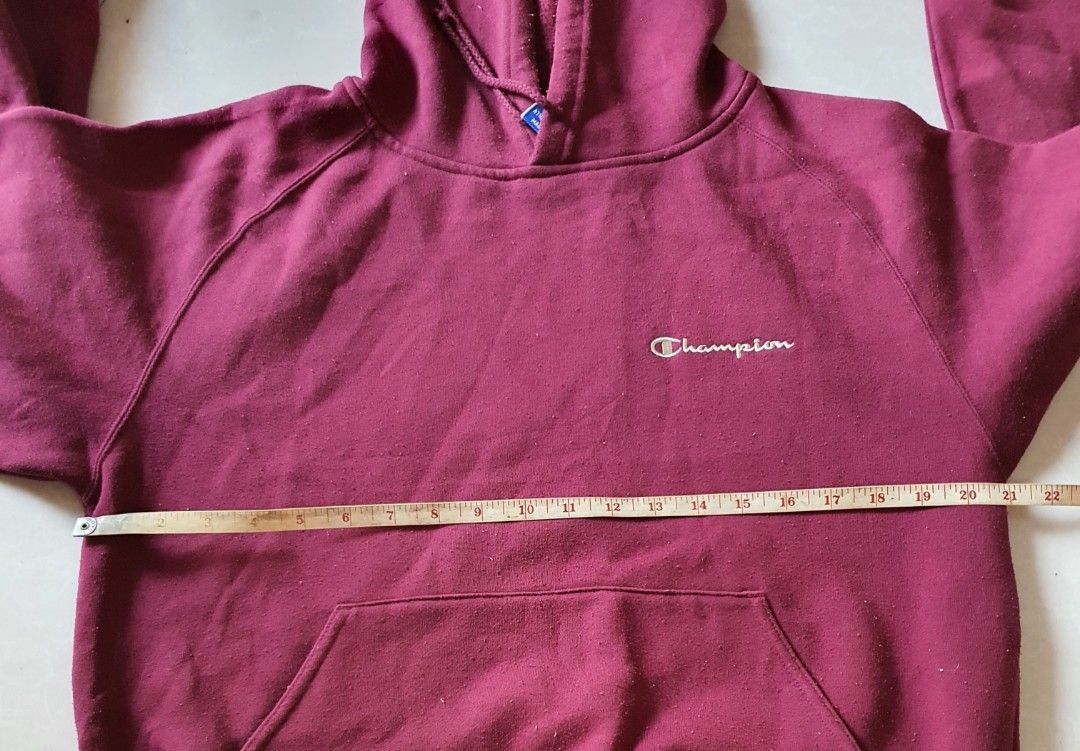 Champion Reverse Weave Hoodie Burgundy Medium (Category: Hoodies) located in Meycauayan. Submitted by shoptoown (Listing ID 1463339479, Image 3). Description: - Burgundy Champion hoodie - Classic pullover style - Front pocket - Embroidered Champion logo on chest - Ribbed cuffs and hem - Size: Medium - Ideal for casual wear.
