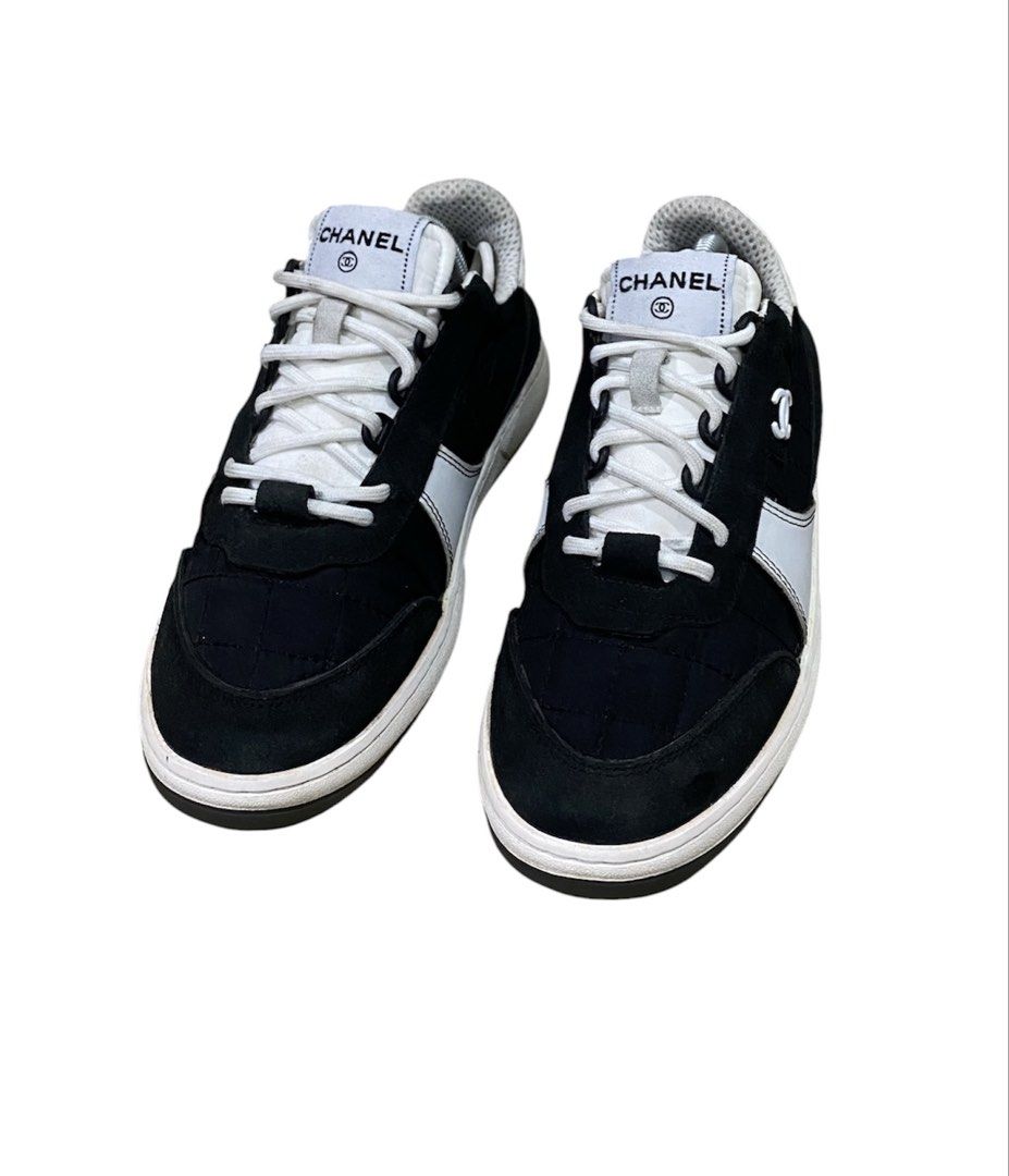 Chanel Black & White CC Logo Sneakers (Category: Sneakers) located in Digos. Submitted by zhanderapp47607 (Listing ID 1463451099, Image 2). Description: -size 36 / Cm 23 - Classic Chanel sneakers - Color: Black with white accents - Features iconic CC logo - Lace-up style - Ideal for casual wear - A stylish addition to any outfit.