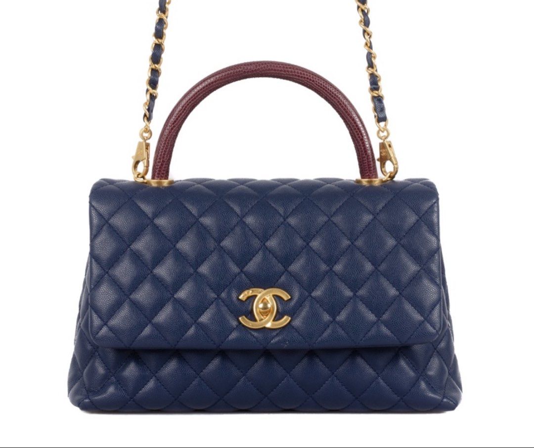 CHANEL Coco Small Navy/Burgundy Leather Lizard Top Handle Bag (Category: Luxury Bags & Wallets) located in Taguig. Submitted by luxeinofficial (Listing ID 1463350562, Image 3). Description: CHANEL Coco Small Navy/Burgundy Leather Lizard Top Handle Bag SKU: 1LKF4D Gender: Ladies Material: Caviar leather and lizard leather Stamp: 24077468 Year: 2017-2018 Interior: One main compartment, one zipper pocket, one pen pocket and two open pockets Measurem