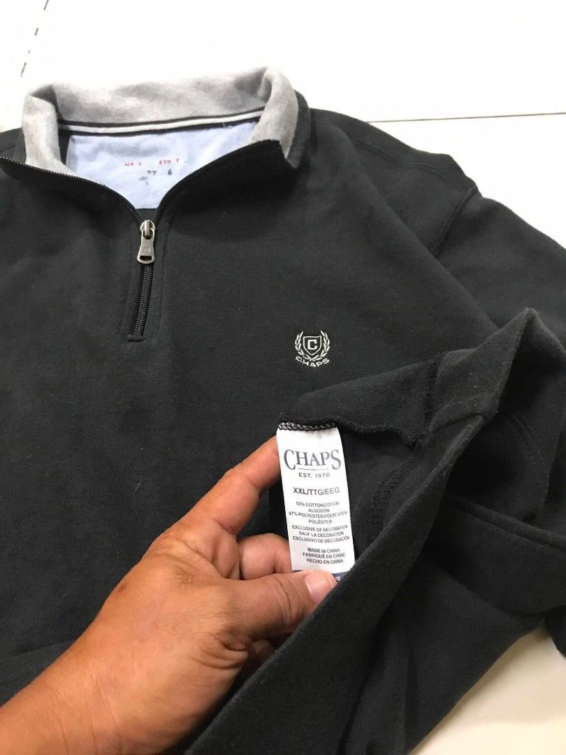 Chaps Black 1/4 Zip Sweatshirt XXL (Category: Coats, Jackets and Outerwear) located in Manila. Submitted by youngstorm-c604 (Listing ID 1463435793, Image 3). Description: - Black Chaps sweatshirt - Size: XXL - 1/4 zip neckline - Grey collar lining - Small Chaps logo embroidered on chest - Material: Cotton and polyester blend - Ideal for casual wear.