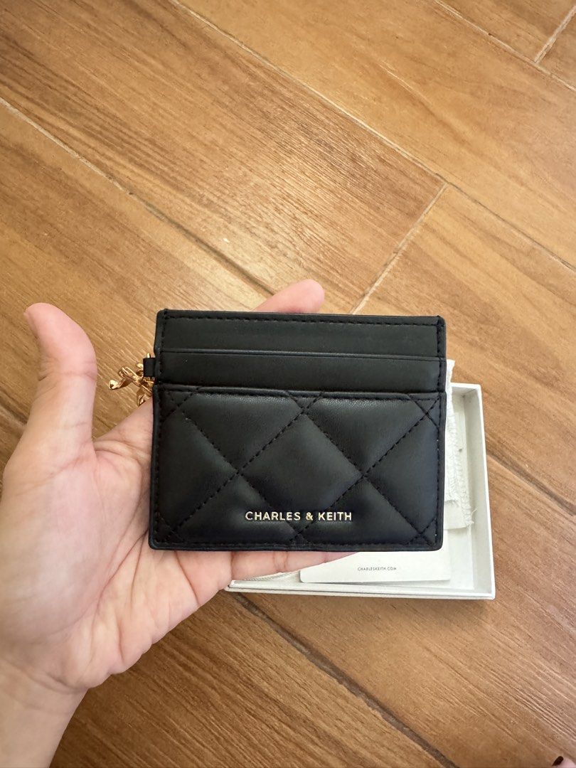 Charles & Keith Arrietty Cardholder (Category: Wallets & Card holders) located in Manila. Submitted by clutterfinds_ (Listing ID 1463350969, Image 2). Description: > 💯 original! (money back if proven fake) > bought from CNK store in SG last January! (no more receipt) > comes with it’s original box > no flaw/scratches > in pristine condition > retails for ₱1,599 on CNK website.