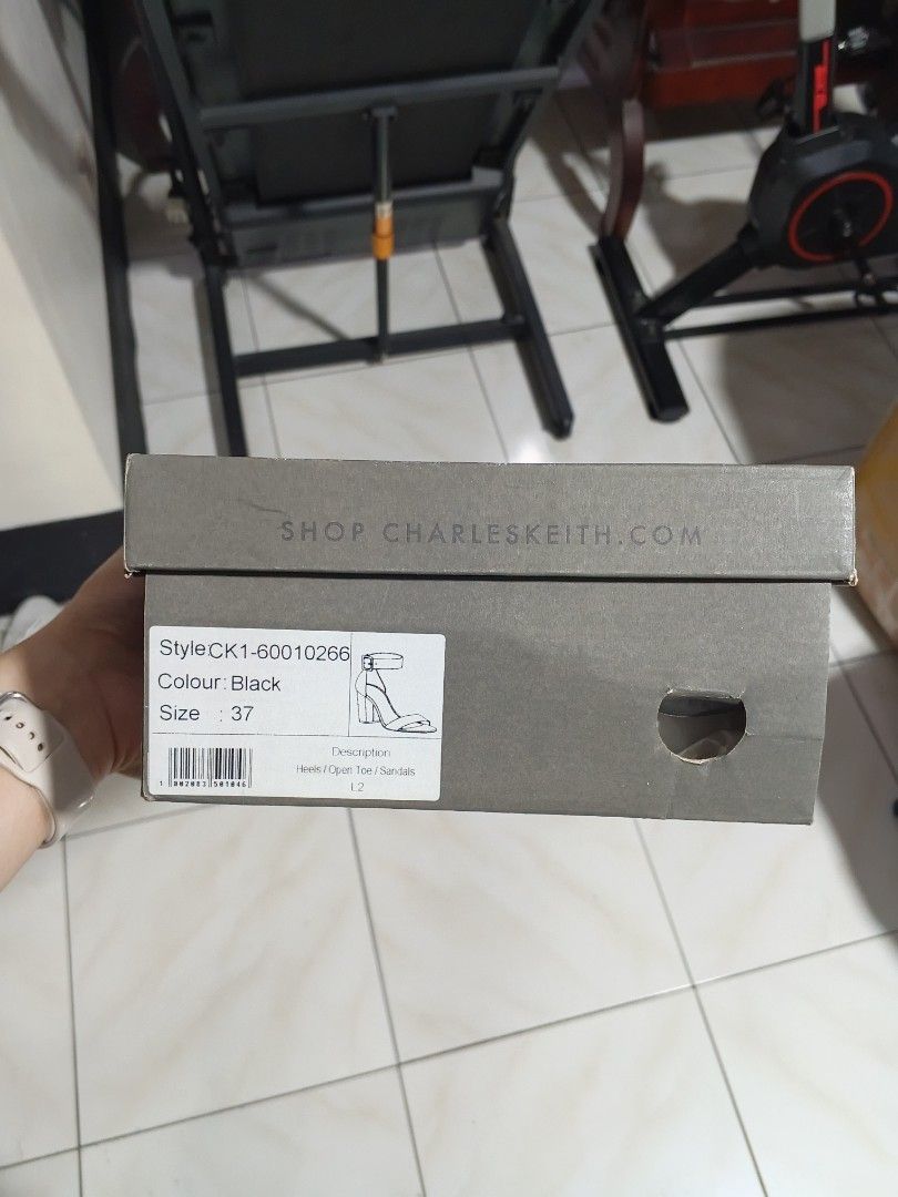 Charles & Keith Black Heels Size 37 (Category: Heels) located in Caloocan City. Submitted by fastriver-4c93 (Listing ID 1463408783, Image 2). Description: - Brand: Charles & Keith - Color: Black - Size: 37 - Style: Open toe heels - Closure: Ankle strap with buckle - Condition: Comes with original box - Where to buy: Charles Keith dot com.
