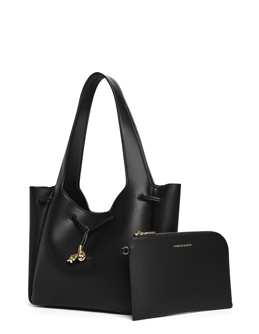 Charles & Keith Mila Tote Bag (Category: Tote Bags) located in Pasig City. Submitted by adiuhsa (Listing ID 1463356995, Image 1). Description: - bought last january - only used once - with dust bag.