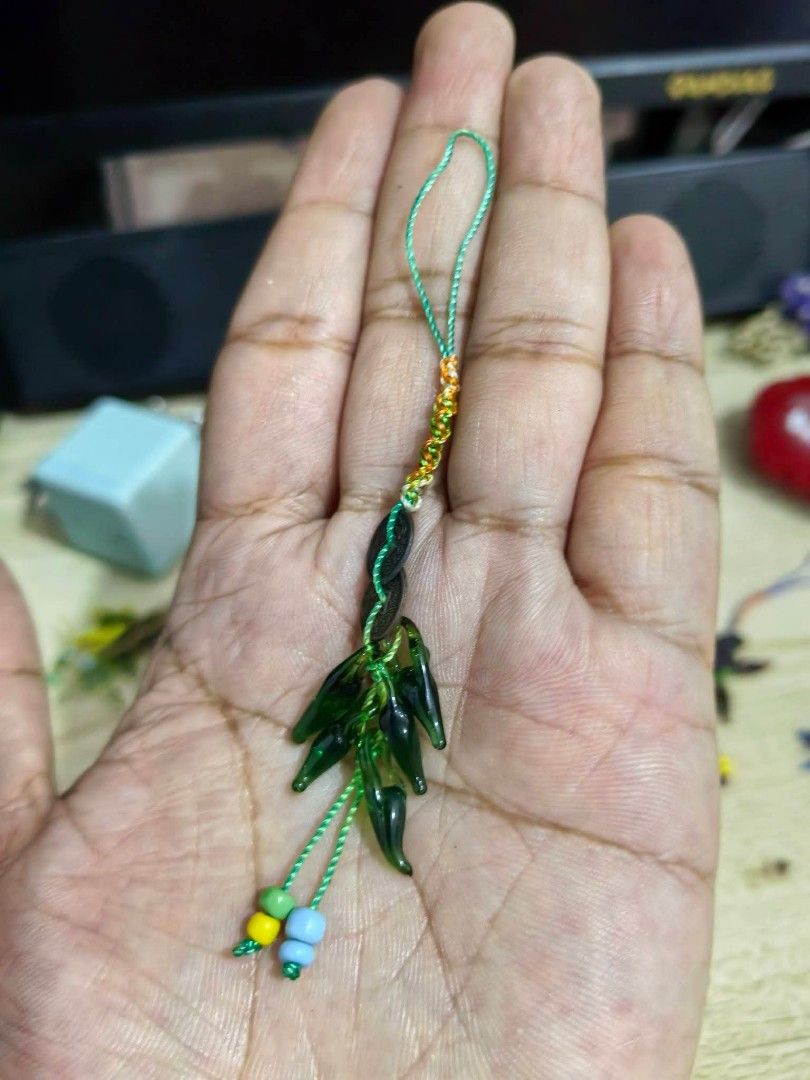 Charm - Green Chilli (Category: Charms) located in Cebu City. Submitted by dudes_villanueva (Listing ID 1463359698, Image 3). Description: Charm - Green Chilli 📌 In excellent condition. 📌 Chinese coins and beads, commonly used for feng shui, wealth, and protection..