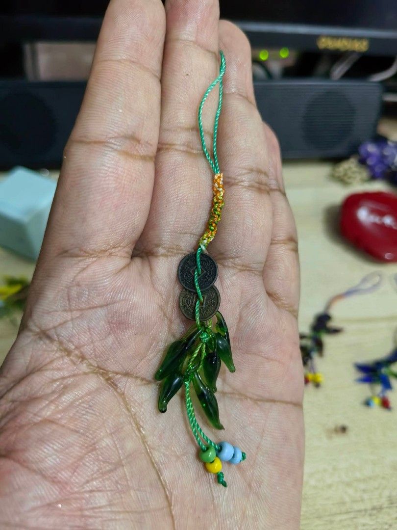 Charm - Green Chilli (Category: Charms) located in Cebu City. Submitted by dudes_villanueva (Listing ID 1463359698, Image 2). Description: Charm - Green Chilli 📌 In excellent condition. 📌 Chinese coins and beads, commonly used for feng shui, wealth, and protection..
