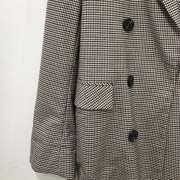 Check Double Button Jacket (Category: Coats, Jackets and Outerwear) located in Singapore. Submitted by bunjangpartners (Listing ID 1463336487, Image 3). Description: This is a women's outerwear jacket. It features a check pattern and a double button design. Chest: 53 Total length: 91 --[Before You Buy]-- Sourced from Bunjang, Korea's leading recommerce platform through our purchasing agency service. All items are pre-owned; titles, descriptions a