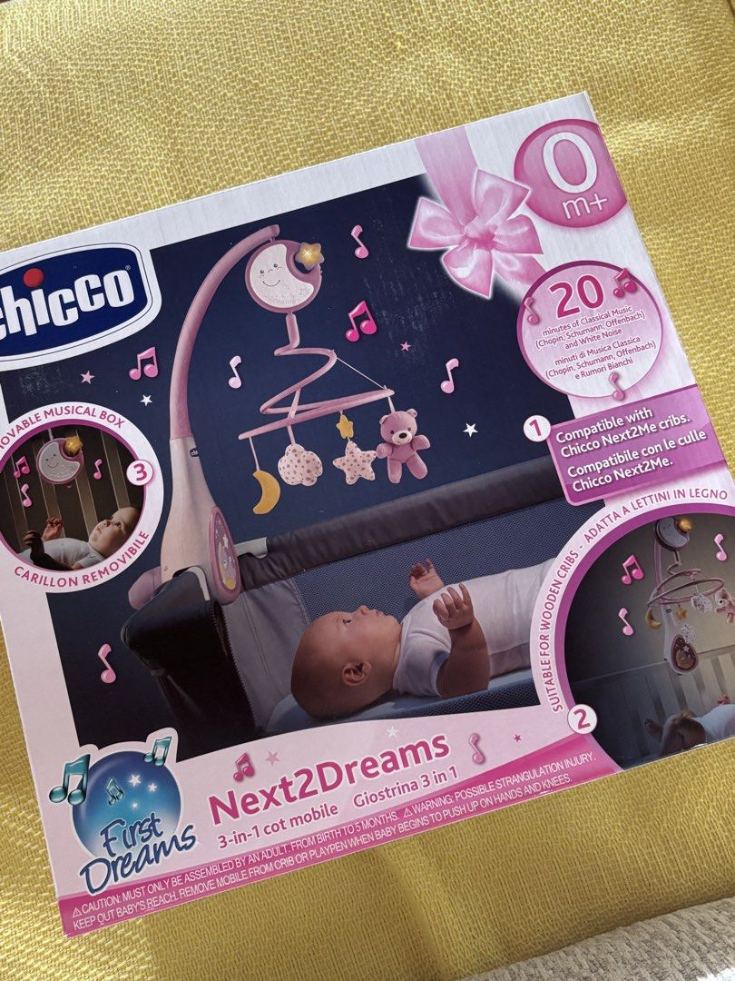 Chicco Next2Dreams 3-in-1 Cot Baby Mobile (Category: Infant Playtime) located in Manila. Submitted by issajali (Listing ID 1463335530, Image 1). Description: - Chicco Next2Dreams 3-in-1 cot mobile - Plays 20 minutes of classical music and white noise - Features a removable musical box - Compatible with Chicco Next2Me cribs and standard wooden cribs - Suitable for babies from birth to 5 months - Orig price : 1900+ RFS: extra.