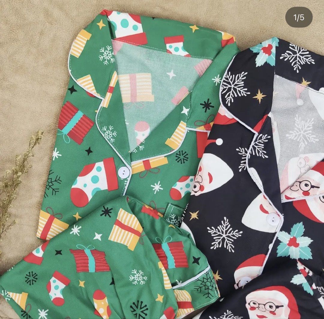 Christmas Sleepwear Shorts terno Set (Category: Undergarments & Loungewear) located in Manila. Submitted by chavirly (Listing ID 1463554115, Image 1). Description: - Festive Christmas Sleepwear Set - Available Prints: Santa Claus & Snowflakes and Green with Stockings & Gifts - Features: Short sleeves and button-up top with shorts terno - Material: Soft fabric for ultimate comfort - Perfect for: Holiday lounging, Christmas morning, or as a thought