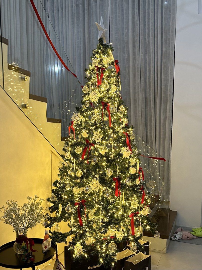 CHRISTMAS TREE 8FT WITH ORNAMENTS AND LIGHT (Category: Other Home Decor) located in Bulacan. Submitted by declutteringm0m (Listing ID 1463374938, Image 2). Description: LIKE NEW super ganda and punong puno ng lights lahat ng ornaments kasama .