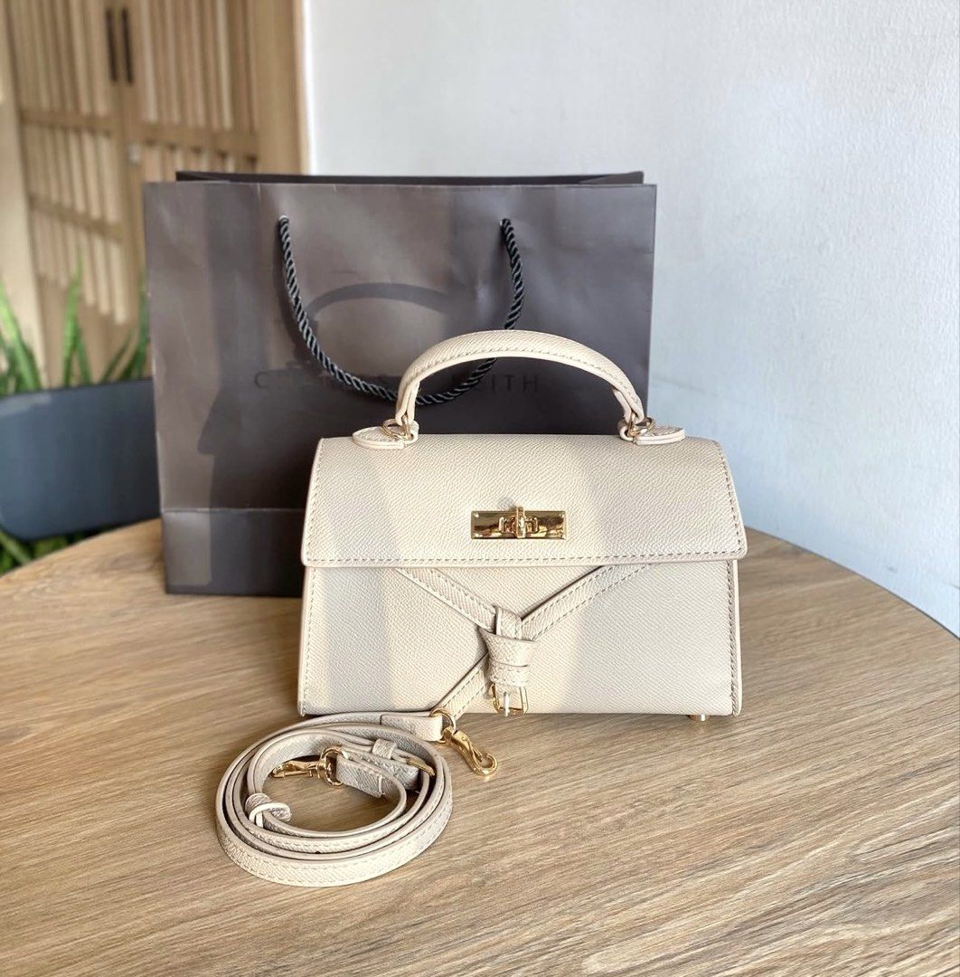C&K Tricha Knotted-Belt Top Handle Bag (Category: Cross-body Bags) located in Bulacan. Submitted by mykakarizza (Listing ID 1463511955, Image 2). Description: NEW✨✨ ₱800 onlyyy C&K Tricha Knotted-Belt Top Handle Bag Size: Width 17-20 cm Depth 5 cm Height 12 cm Add paperbag 100 📸 Actual pics! 🙋🏻‍♀️ ─── ✦ ─── ✦ ─── ✦ ─── ✦ ─── 🛍️ LOOKING FOR MORE RESELLERS 🛍️ ✨ Buy 3 pcs of ANY items — FREE SHIPPING NA!🚚 ✨ Buy 10 items → FREE SF + ₱50 OFF EAC